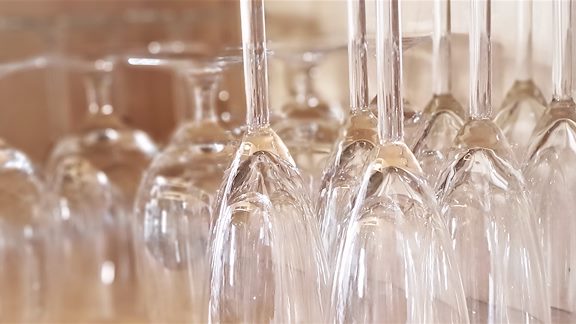 Champagne and beer glasses standing upside down.